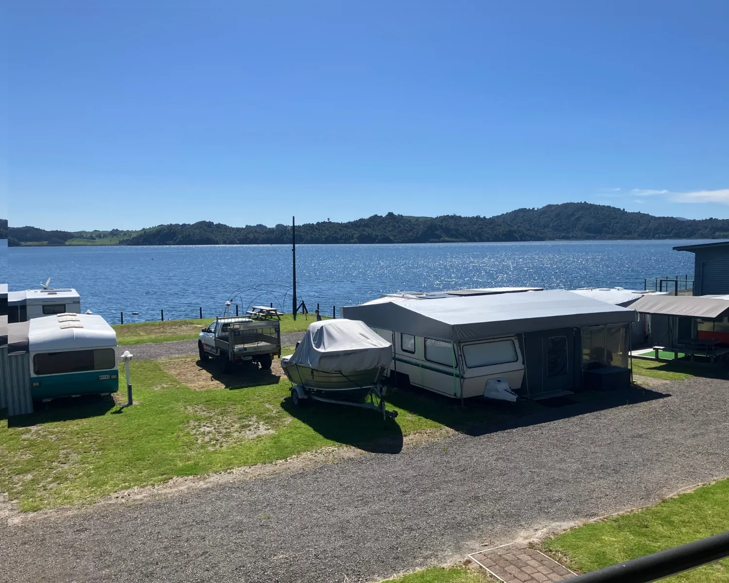 Campsite and lake from top house